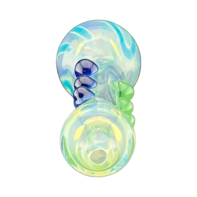 Bumped body of the teal, green and blue fumed glass one-hitter chillum, a tobacco pipe at El Paso Smoke Shops