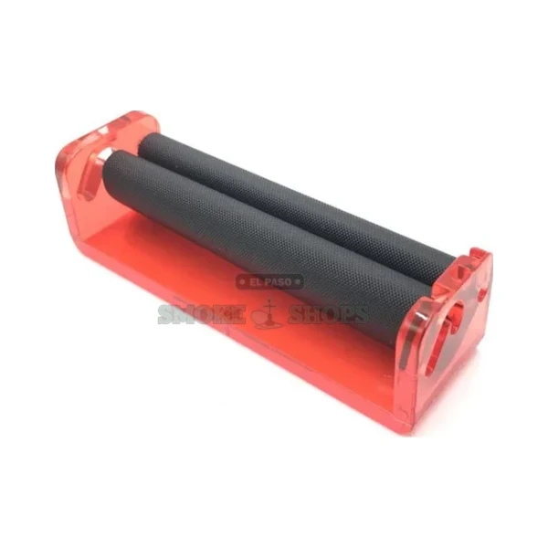 Token 78mm cigarette rolling machine in black and red on the counter at an El Paso Smoke Shops location
