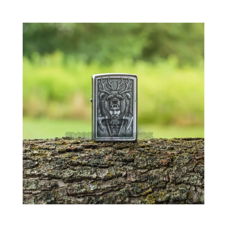 Zippo Barbarian lighter open with lid up showing the flint wheel and wick on a Street Chrome case