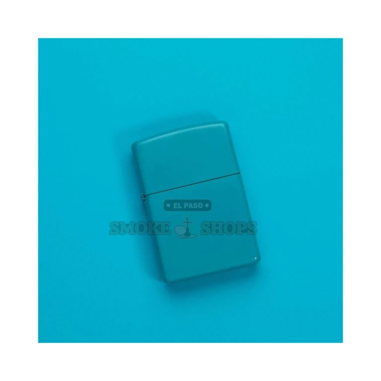 Zippo Flat Turquoise 49454 lighter open with lid raised, showing the windproof chimney and flint wheel