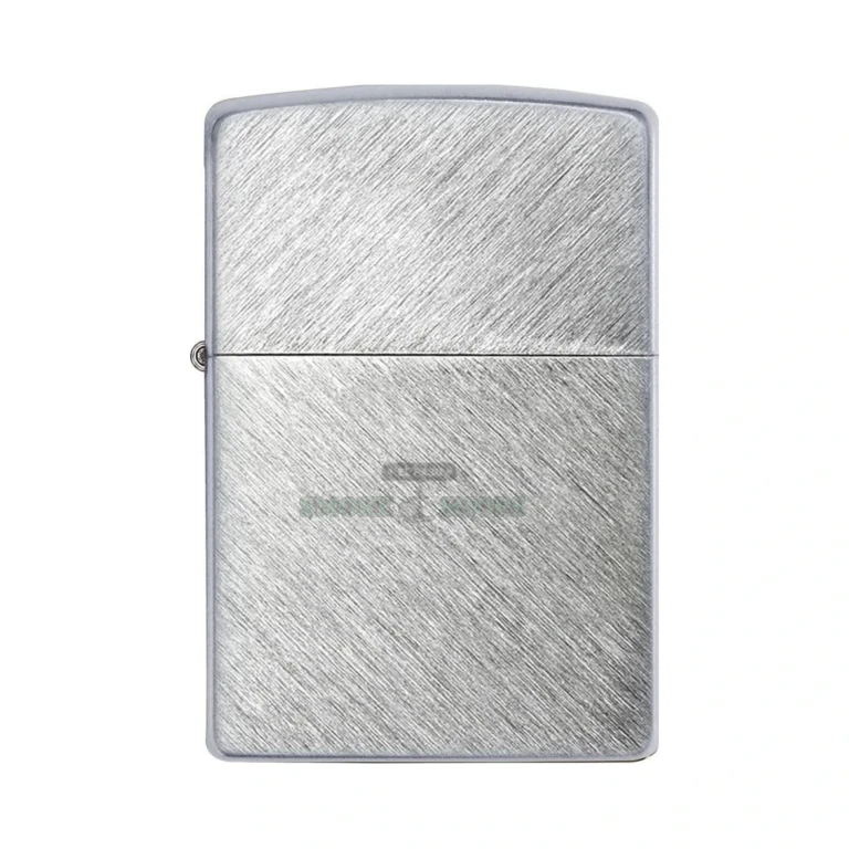 Zippo Herringbone Sweep brushed chrome lighter held in hand for scale