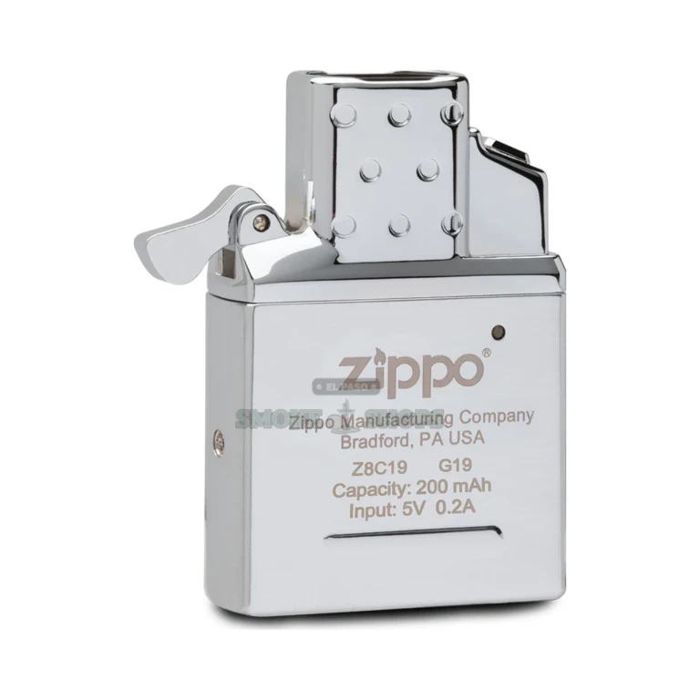 Zippo Double Beam insert lifted from a classic Zippo case, showing the rechargeable double-arc unit, El Paso shop