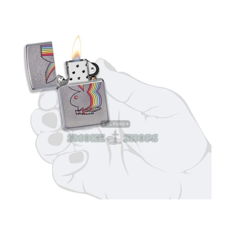 Open Zippo Playboy lighter with lifted lid and windproof chimney, licensed rabbit design, El Paso Smoke Shops