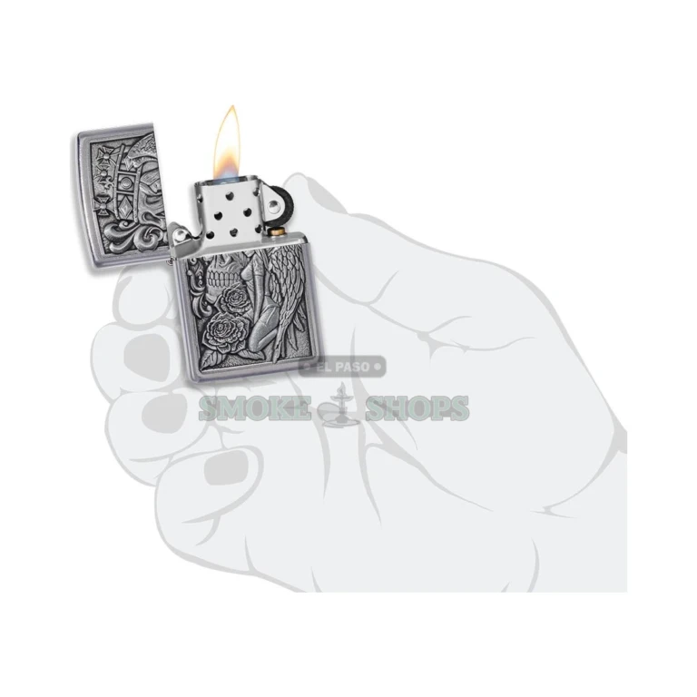 Zippo Skull and Angel Emblem Street Chrome windproof lighter 49442 standing closed, crowned skull and angel emblem facing forward