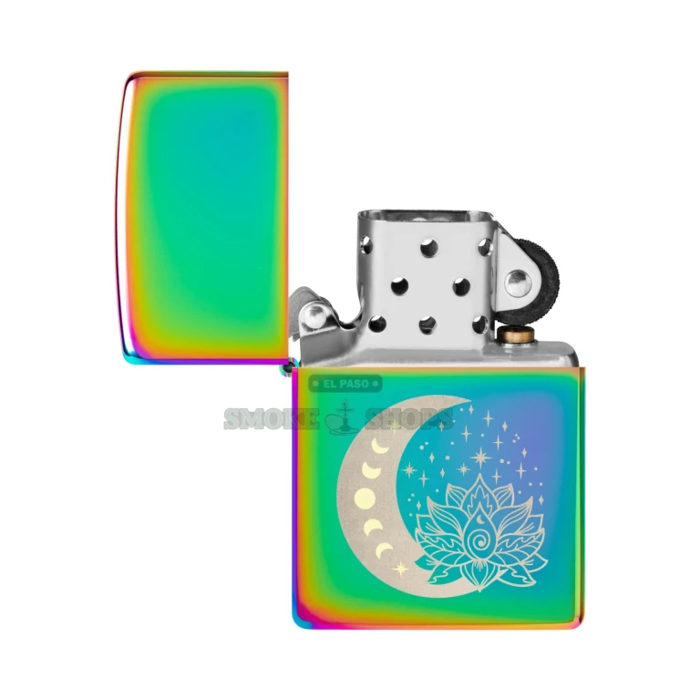 Zippo Spiritual Design windproof lighter 48910 with a lotus flower framed by the moon and stars in brass-and-chrome laser two-tone finish