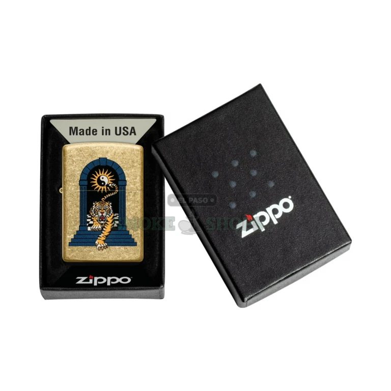 Close-up of the engraved tattoo-style tiger design reflecting on the mirror high polish brass surface of the Zippo 29884
