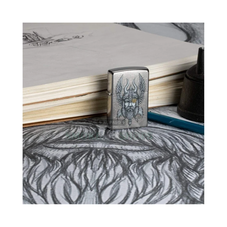 Close-up of the hand-drawn pen-and-ink Viking warrior illustration on the Zippo 29871 Street Chrome case