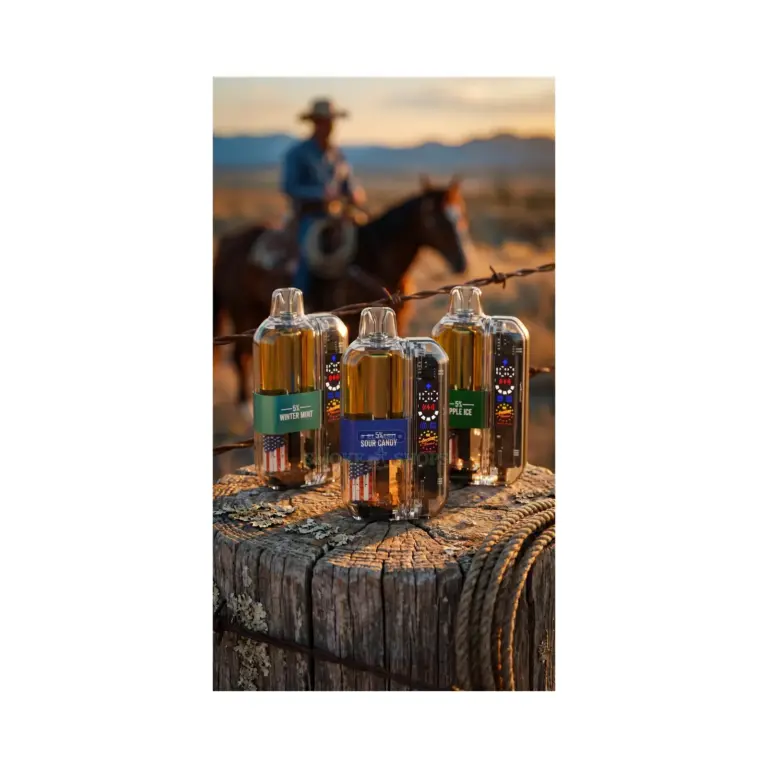 American Standard 50K Disposable Vape Kit, three devices on a weathered fence post at sunset, sold at El Paso Smoke Shops